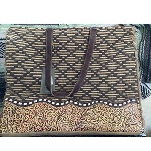 Myra tooled leather weekender